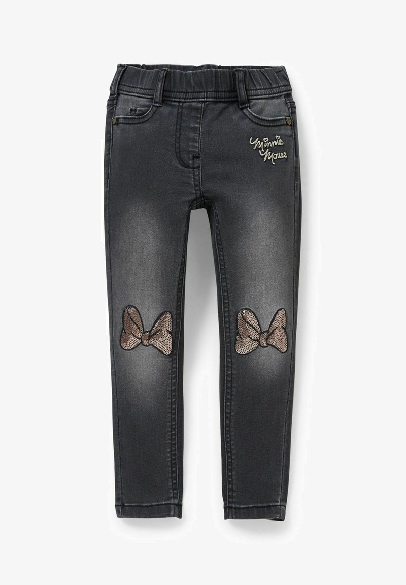 Jean enfant gris foncé avec taille élastique, texte « Minnie Mouse » sur la poche et patchs nœud pailletés aux deux genoux.
