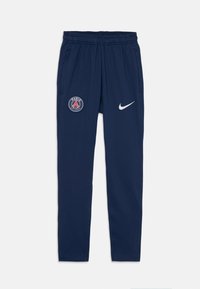 Námorné joggery s elastickým pásom, bočnými vreckami, logom Paríža na ľavom stehne a bielym logo Nike na pravom.