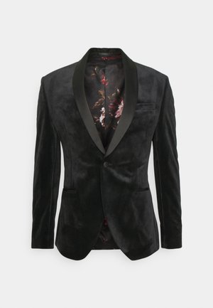 Černý sametový blazer s šálovým límcem a saténovými detaily, jedním knoflíkovým zapínáním a saténovou podšívkou s květinovým vzorem.