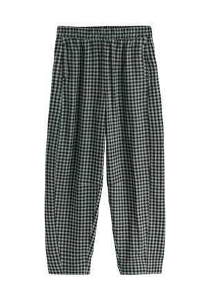 Black and white checkered pants with an elastic waistband, two side pockets, and a tapered leg design, made from a lightweight fabric.