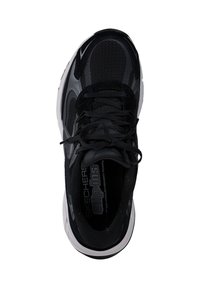 Svart och grå Skechers Slip-ins sko med snörning, nät- och syntetöverdel, samt vit vadderad sula sedd uppifrån.