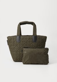 Kwiatowy oliwkowy torba typu tote z geometrycznym wzorem i czarnymi skórzanymi akcentami. Zawiera małą dopasowaną torbę na zamek błyskawiczny.
