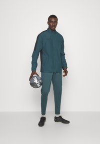 Nike Performance DRI-FIT ACADEMY PANT - Træningsbukser - deep jungle/black
