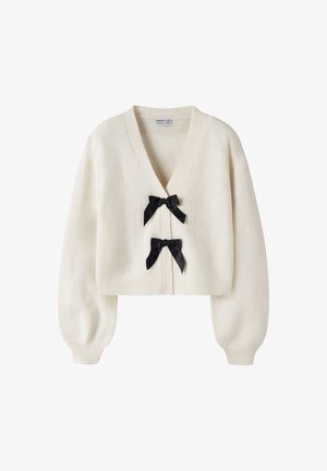 Cardigan à manches longues couleur crème avec un profond col en V et deux nœuds en ruban noir comme fermetures avant, poignets et ourlet côtelés.
