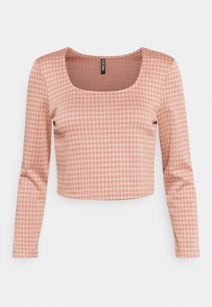 Vaaleanpunavalkoruudullinen pitkähihainen lyhyt paita, jossa on neliömäinen pääntie ja pehmeä resorikangas.