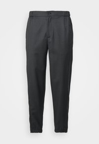 Black striped trousers with an elastic waistband, tapered fit, and cuffs at the ankles. Made of lightweight fabric with subtle texture.