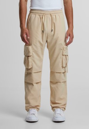 TARO - Cargobukser - beige