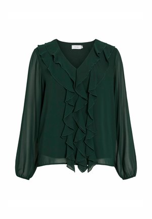 Blusa de color verde oscuro hecha de una tela ligera, con escote en V, mangas largas y prominentes detalles de volantes a lo largo del frente.