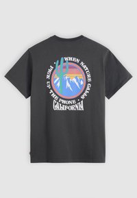 Black cotton t-shirt featuring a colorful graphic with a cactus and mountains inside a circle. Text reads “When nature calls. California.”