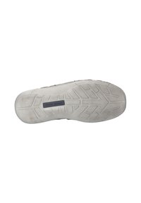 Shoe sole with a textured gray rubber surface, featuring a geometric tread pattern for grip and stability, labeled "JOSEF SEIBEL."