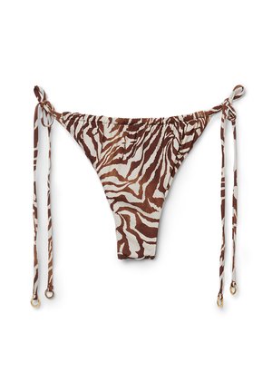 Bas de bikini à imprimé zèbre marron et blanc avec des cordons à nouer sur le côté et des accents en doré. Fabriqué en tissu doux et extensible.