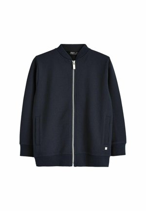 Granatowa kurtka na zamek z fakturowanym splotem, prążkowanym kołnierzem i mankietami, bocznymi kieszeniami oraz małym logo przy dolnym brzegu.