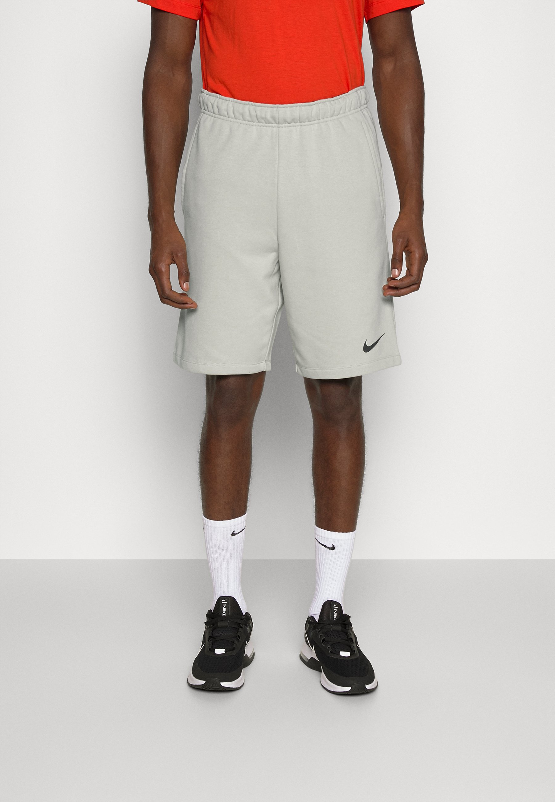 Nike Performance Pantalón corto de deporte - light stone/black/beige -  Zalando.es