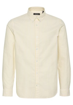 Košela s gombíkmi vo svetlej žltej farbe s tenkými vertikálnymi prúžkami, vyrobená z priedušného materiálu. Obsahuje špicatý golier a dlhé rukávy.