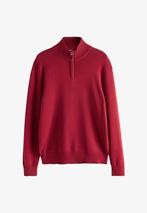 Rød pullover-sweater med høj, ribbestrikset krave og halv-lynlås design. Har lange ærmer samt ribbestrikkede manchetter og kant for et tætsiddende look.
