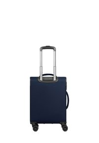 Valigia rigida blu navy con manico telescopico, quattro ruote multidirezionali e superficie testurizzata. Presenta un manico laterale per la portabilità.