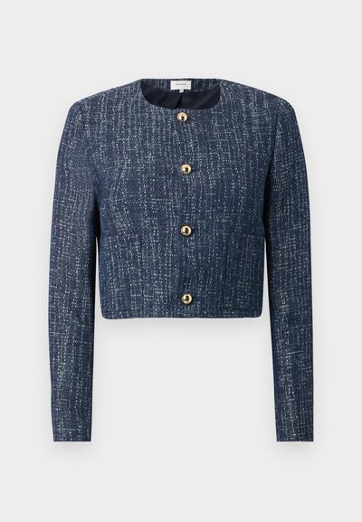 Cropped navy blue jacket made of textured fabric, featuring a round neckline, gold buttons, and long sleeves with a structured fit.