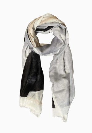 Sciarpa leggera con motivi astratti in nero, bianco, beige e grigio, textura morbida e bordi sfrangiati, drappeggiata con leggerezza.