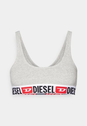 Bralette cinza em algodão com decote profundo e faixa larga em preto e vermelho na parte inferior, apresentando uma textura suave. Alças ajustáveis.