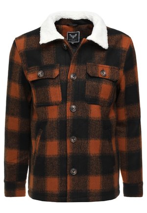 Geruite jas in een zwarte en gebrand oranje wolmix, met een witte fleece kraag, twee borstzakken en een knoopsluiting aan de voorkant.
