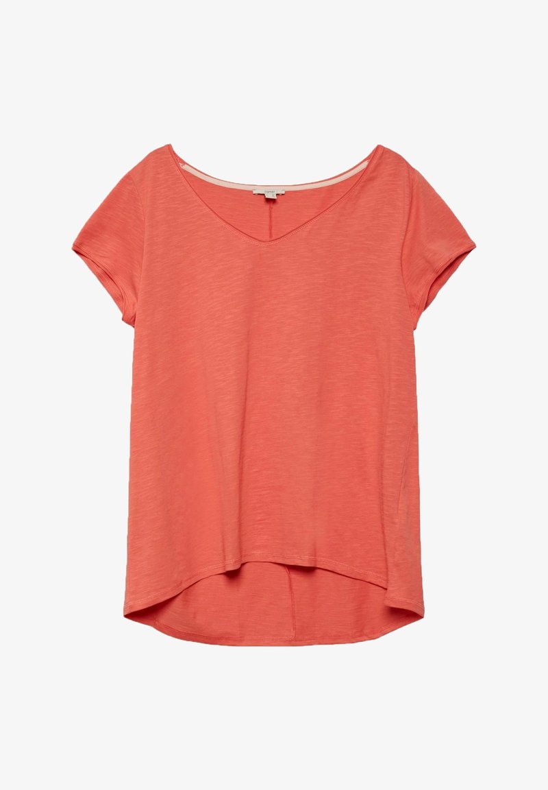 Top pour femme à manches courtes en corail avec col en V et ourlet arrière légèrement plus long, fabriqué en tissu texturé léger.