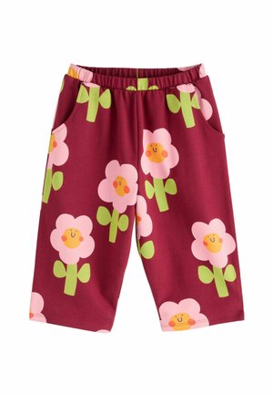 Bordeaux korte broek met elastische tailleband, versierd met grote roze bloemen met lachende gele gezichten en groene stelen, twee zijzakken, gemaakt van katoen.