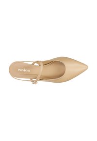 Scarpa beige a punta realizzata in morbida pelle con una sottile cinghia alla caviglia e un delicato dettaglio della fibbia, dotata di una soletta imbottita.