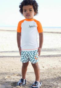 Next SUNSAFE SET - REGULAR FIT - Jogginghose - orange checkerboard