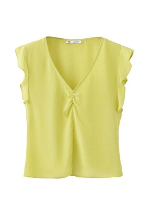 Blouse sans manches vert clair avec col en V et petit détail froncé au centre devant.