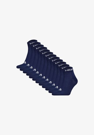 Calzini alla caviglia blu navy, in misto cotone, lunghezza crew, con dettaglio del logo bianco sul bordo, disposti in fila.