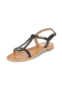 Black leather sandals with a textured finish, featuring thin straps and a flat sole. Open toe design with an adjustable ankle strap.