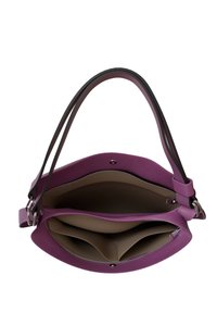 Purple leather handbag with a structured shape and dual-tone straps. Features a smooth texture, magnetic closure, and two inner compartments.