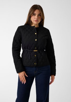 - Kurtka przejściowa