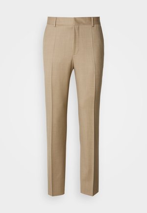 Béžové nohavice na mieru z textúrovaného materiálu, s hladkým predným dielom a rovnými nohavicami. Majú bočné vrecká a pútka na opasok, čo poskytuje upravený vzhľad.