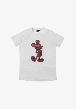 Camiseta blanca de algodón con un gráfico en rojo dentro de la silueta de Mickey Mouse, con frases sobre originalidad y estatus icónico.