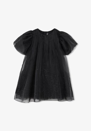 Czarna sukienka z krótkim rękawem, z przezroczystymi bufkami i przezroczystą narzutą ozdobioną małymi czarnymi koralikami.
