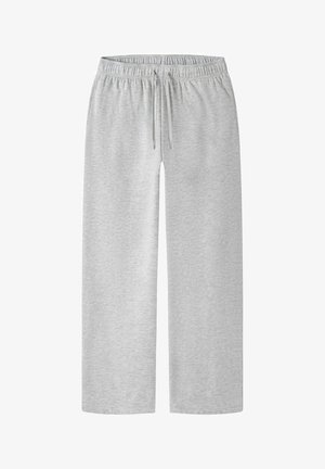 Grijze sweatpants met een losse pasvorm, elastische tailleband met trekkoord en zacht, textuurrijk materiaal. Geen zichtbare zakken of patronen.