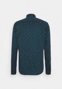 Mörkblå långärmad skjorta med ett blommigt och diamantmönster, med klassisk krage och knäppning vid ärmsluten, tillverkad av ett mjukt tyg.