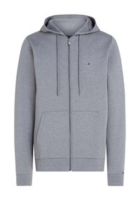 Felpa con cappuccio grigia con cerniera, realizzata in tessuto morbido, con zip frontale, due tasche e cappuccio con coulisse. Piccolo logo del marchio sul petto.