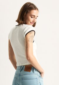 Vans Pusero - white