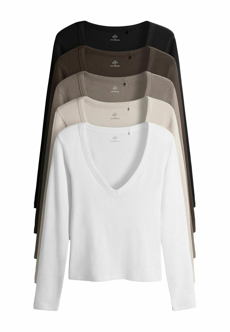 Set di maglie a manica lunga con scollo a V nei colori bianco, beige, marrone e nero. Tessuto a costine, morbido e con vestibilità cropped leggermente elasticizzata.