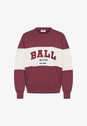 Sudadera de color marrón con una franja de color crema, con la palabra "BALL" en letras negritas, establecida en 1974, y con puños y dobladillo acanalados.