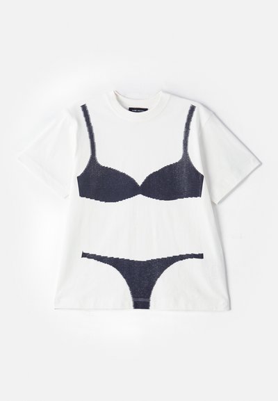 White cotton t-shirt featuring a graphic print of a black bra and thong, with textured lines representing lace detailing and undergarment shapes.