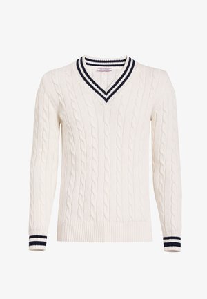 Maglione bianco a trecce con scollo a V e dettagli a righe blu navy sul colletto e sui polsini. Orlo a coste e maniche lunghe.