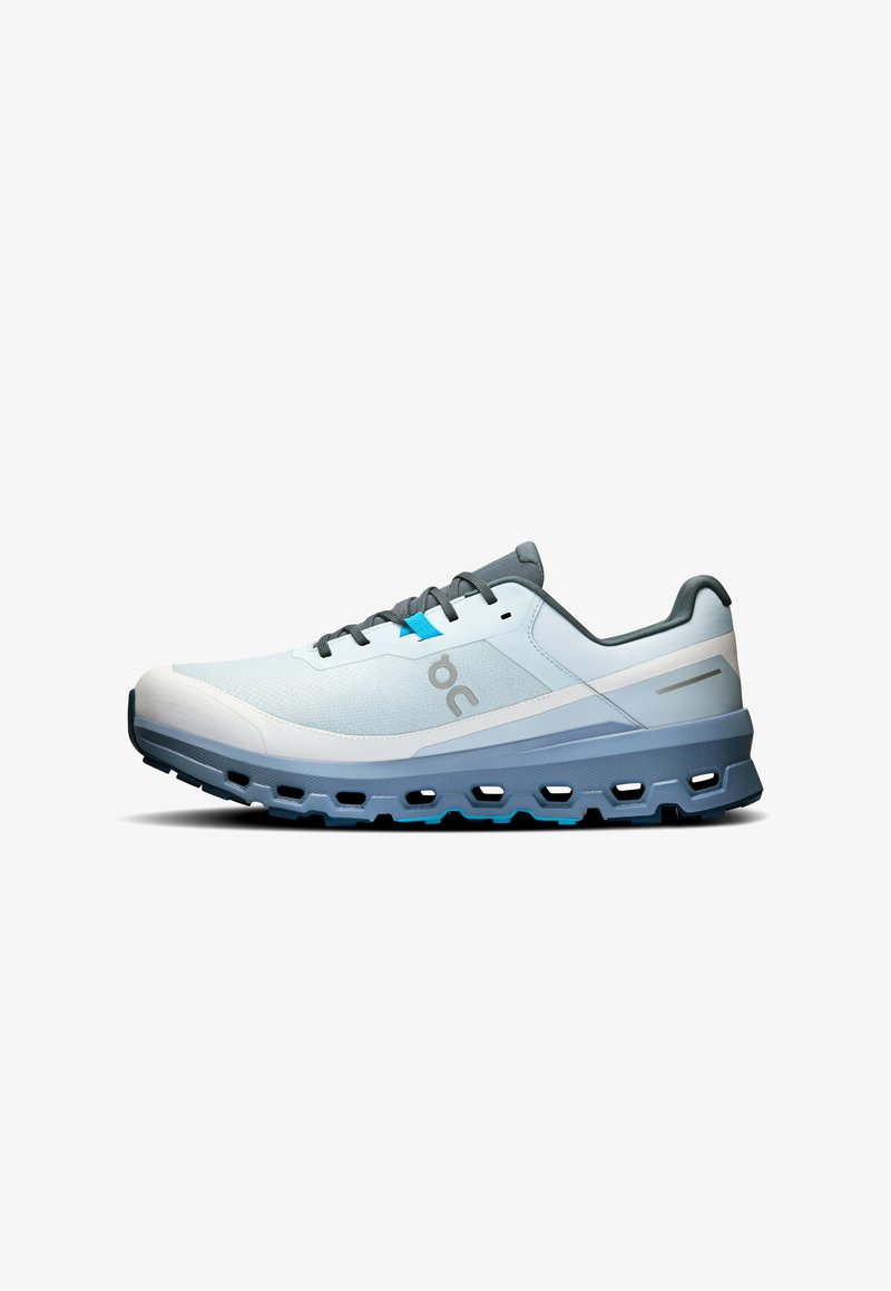 Light blue running shoe with a mesh upper and gray accents, featuring a cushioned sole and a panel design for added support.