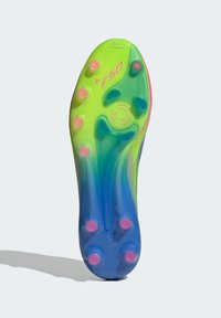 Football shoe sole with a gradient of green to blue, featuring six pink studs, textured surface, and "F50" branding.
