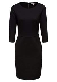 Robe noire longueur genou avec manches 3/4, encolure ronde, taille cintrée et fermeture éclair au dos.