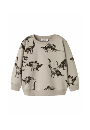 Felpa beige chiaro con stampe di dinosauri nere, tra cui stegosauro e brontosauro, con colletto e polsini a coste.