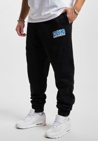 ecko unltd. - COLLEGE JOGGING - Tracksuit bottoms - black Thumbnail Image 1