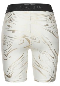Athletic shorts in white fabric with gold marbled pattern. Black waistband with embossed "ATHLETIC" text. Smooth texture, fitted design.